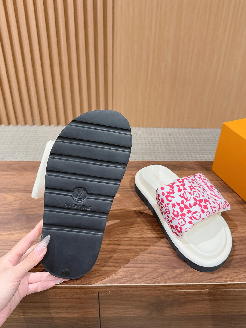 Sandal outsole and pink floral logo-pattern upper with white footbed and dark tread