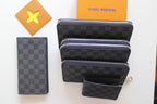 Louis Vuitton small zip pouches with dark checker pattern and top zip pockets