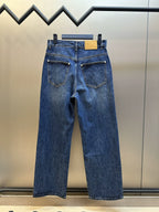 Dark blue denim jeans with two front pockets, belt loops, and button closure.