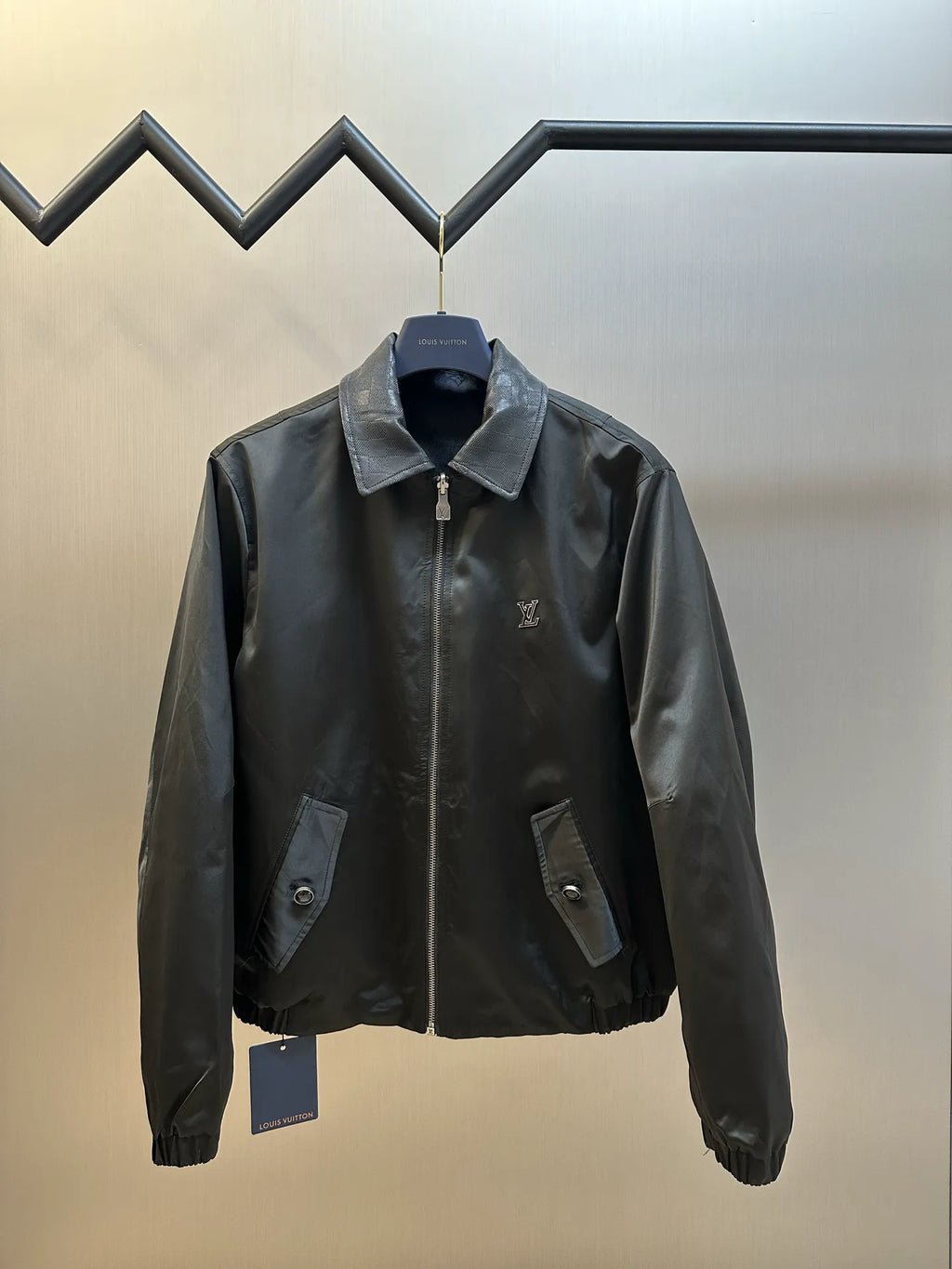 Dark monogram zip-up jacket with stand collar and two front pockets