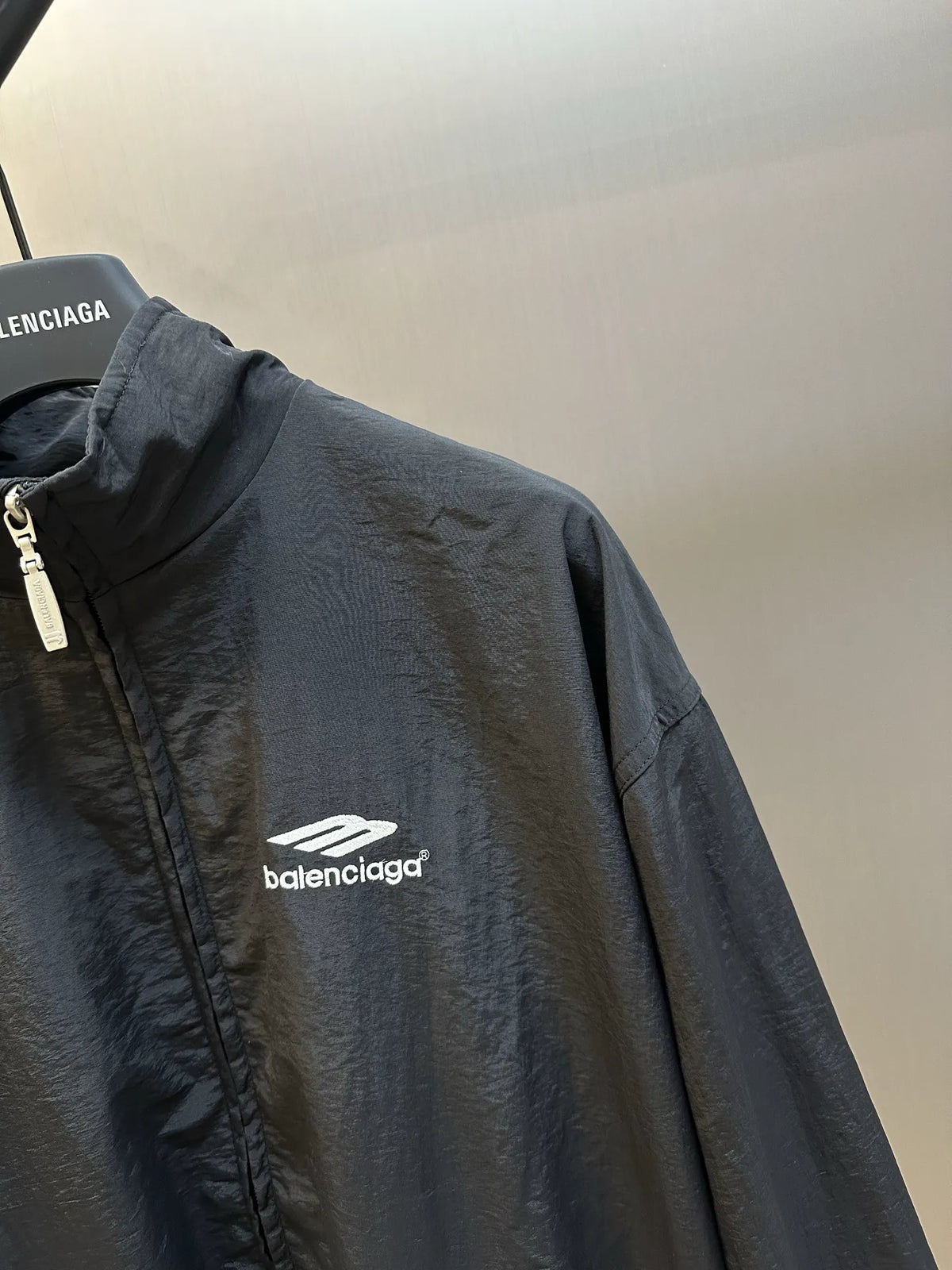 Balenciaga black bomber jacket with chest logo and zip front detail