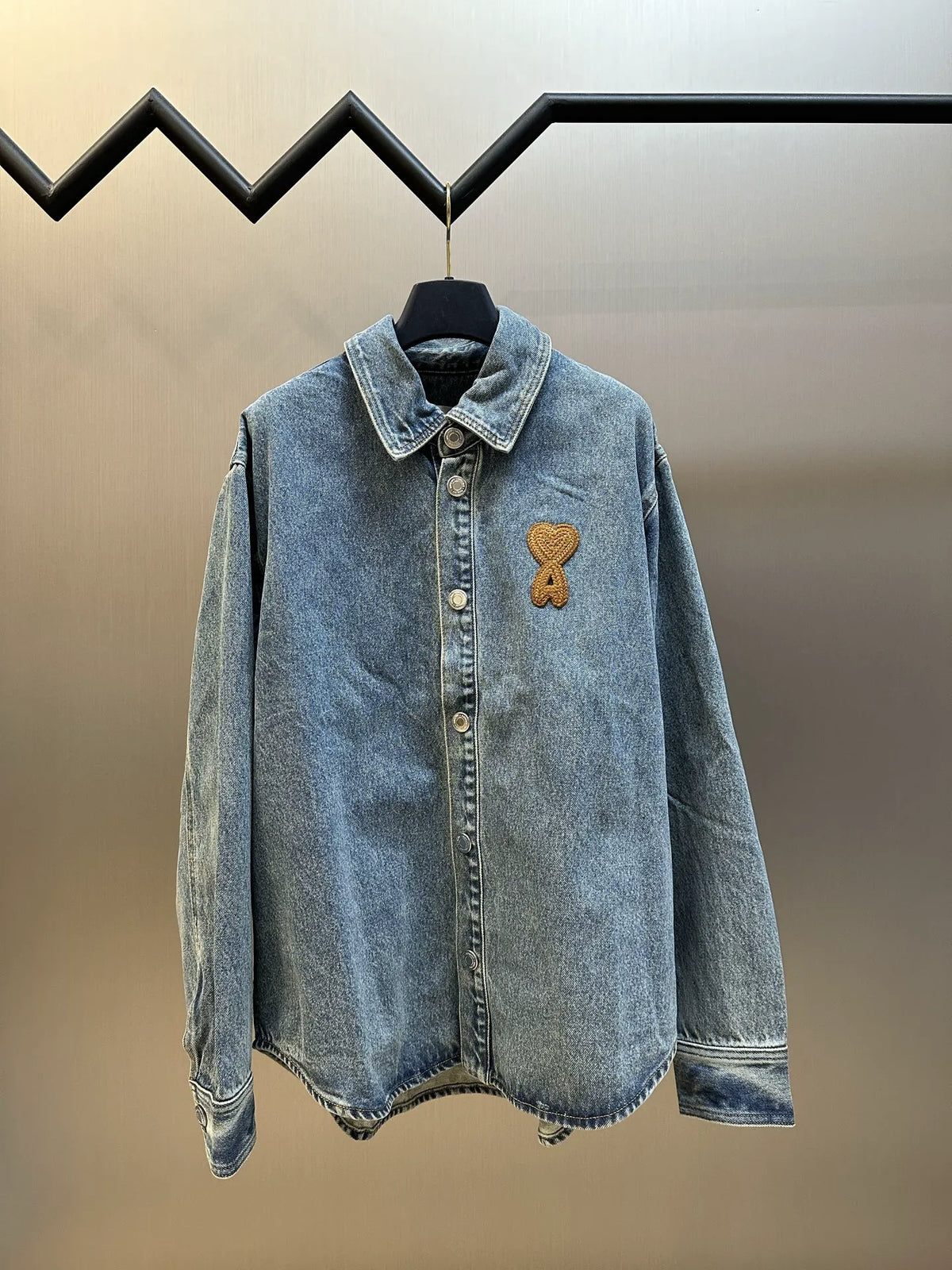 Amiri blue denim jacket with pointed collar and gold embroidered ribbon logo