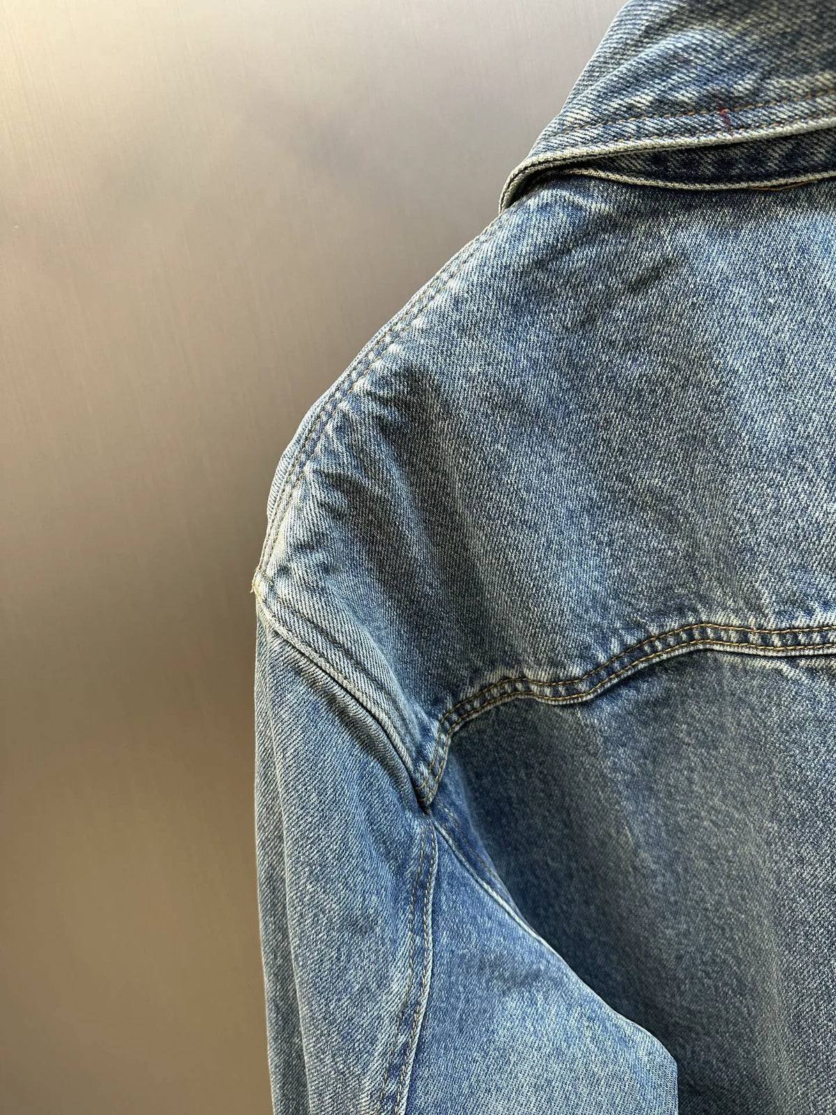 Amiri blue denim jacket shoulder with curved yoke seam