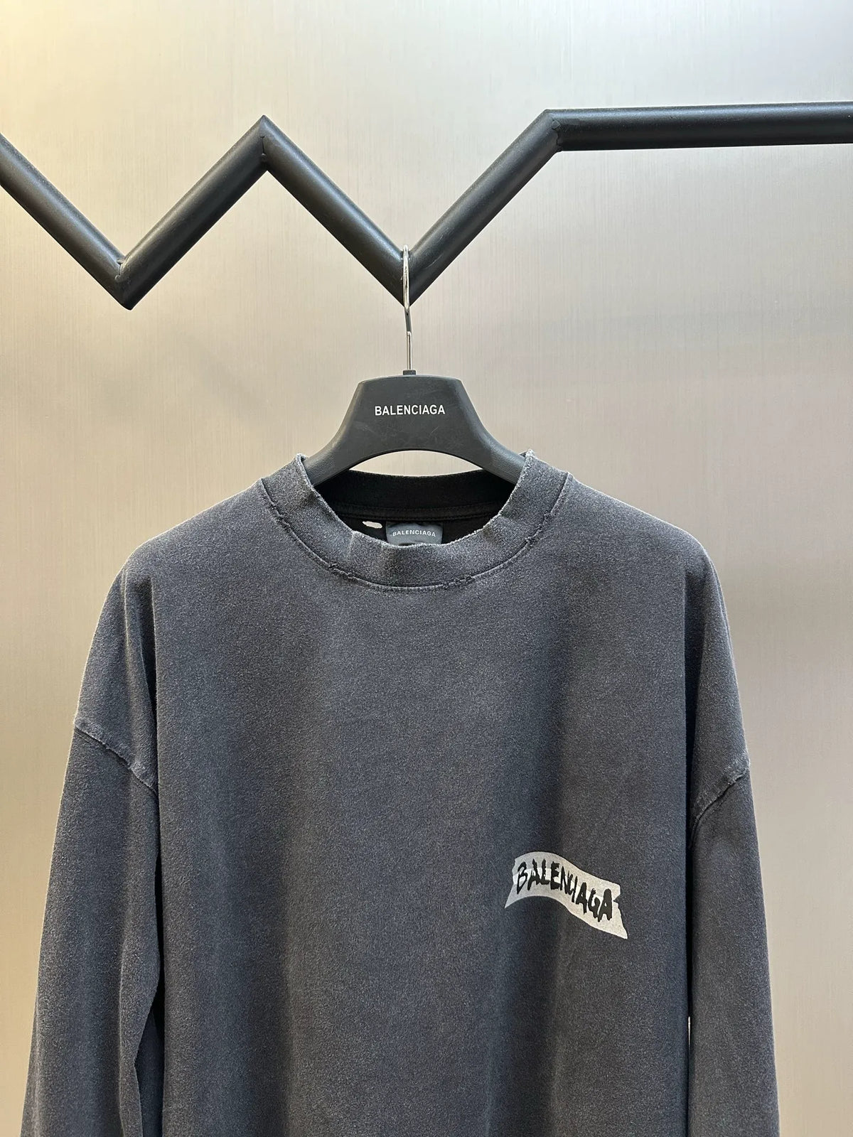 Charcoal long-sleeve crewneck sweatshirt with Balenciaga logo graphic, front view
