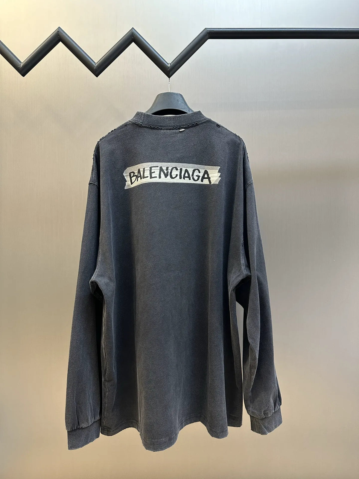 Charcoal long-sleeve crewneck sweatshirt, back view with Balenciaga logo