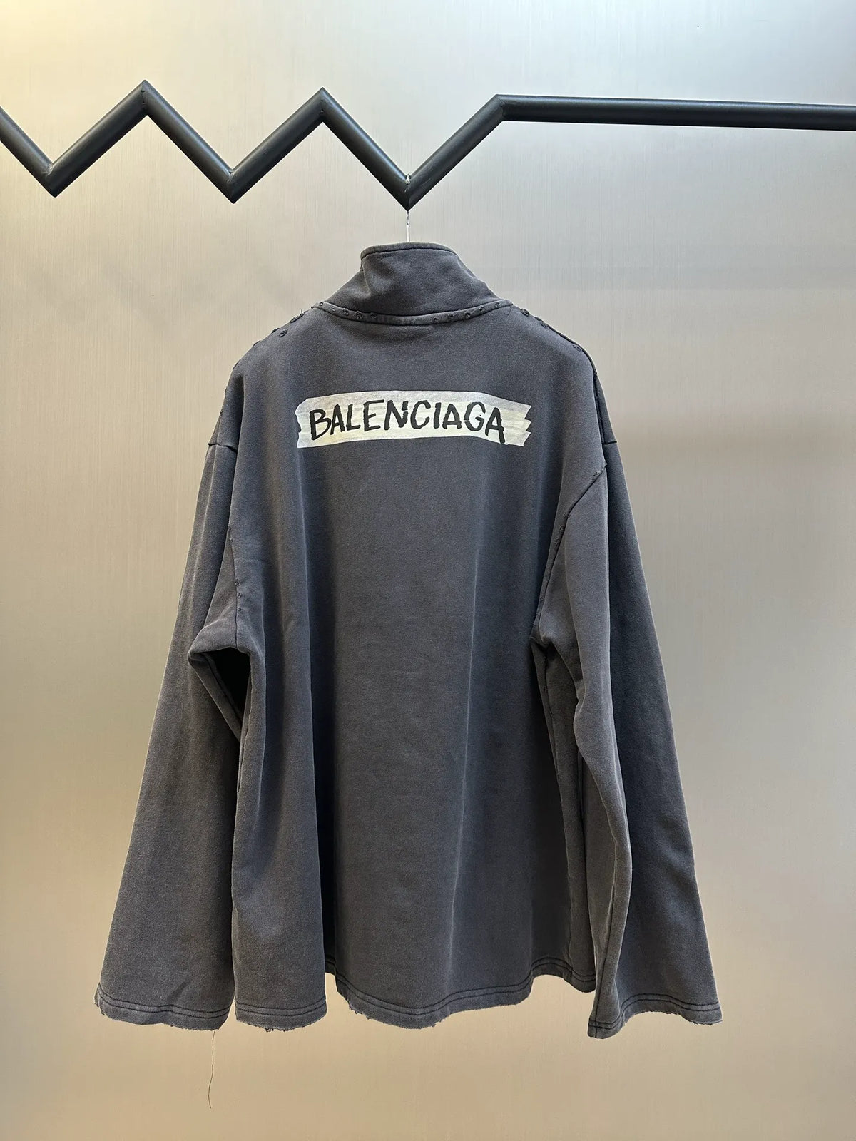 Balenciaga dark gray long-sleeve quarter-zip top with logo on back