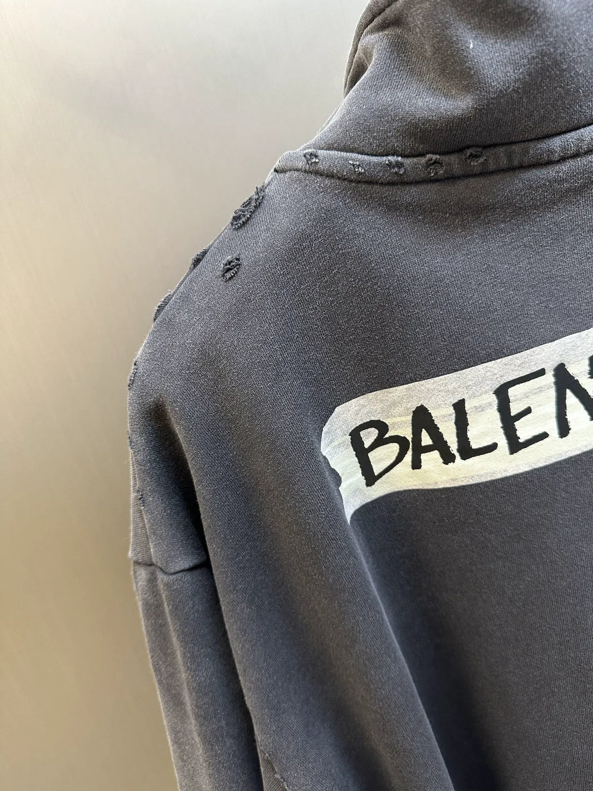 Balenciaga dark gray sleeve with large BALENCIAGA graphic logo print