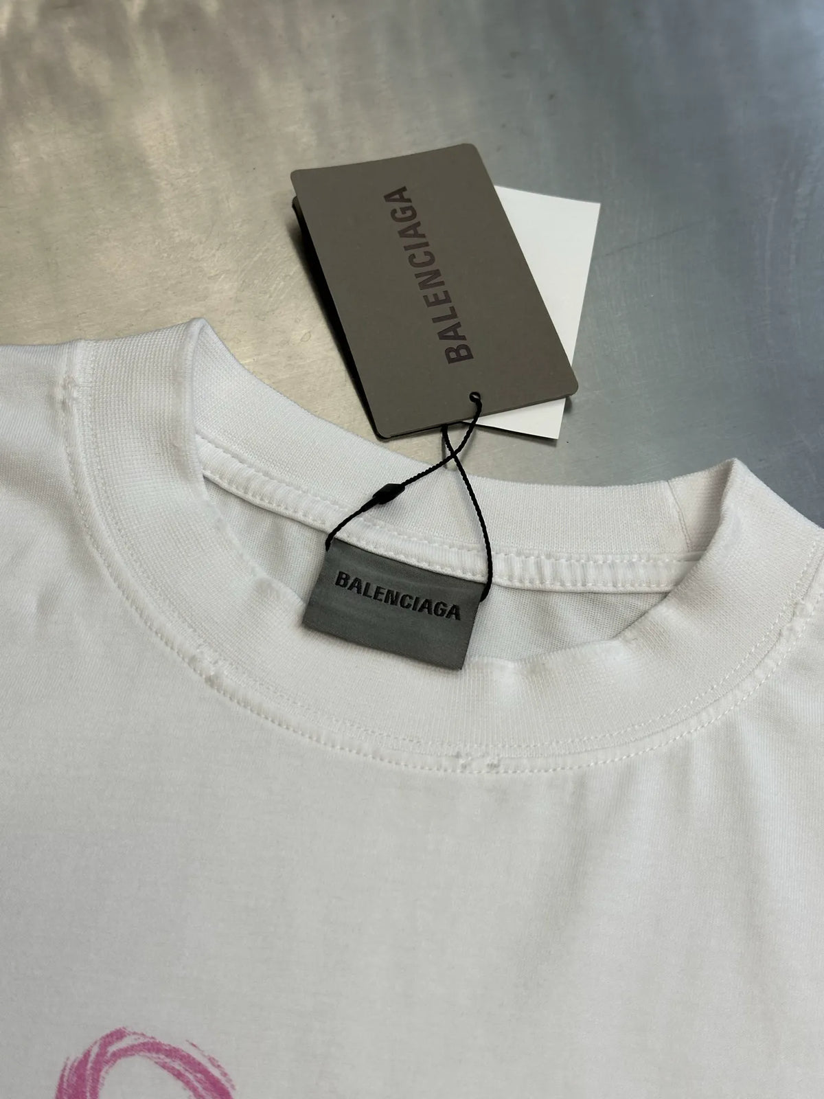 Balenciaga white crewneck T-shirt with attached Balenciaga neck tags