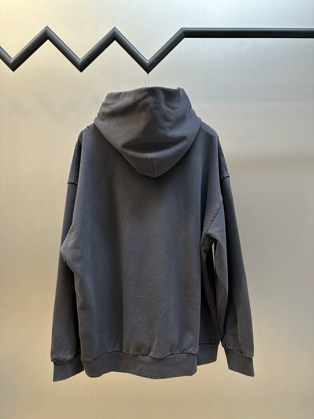 Balenciaga long-sleeve hoodie sweatshirt with cowl hood, back view in dark gray
