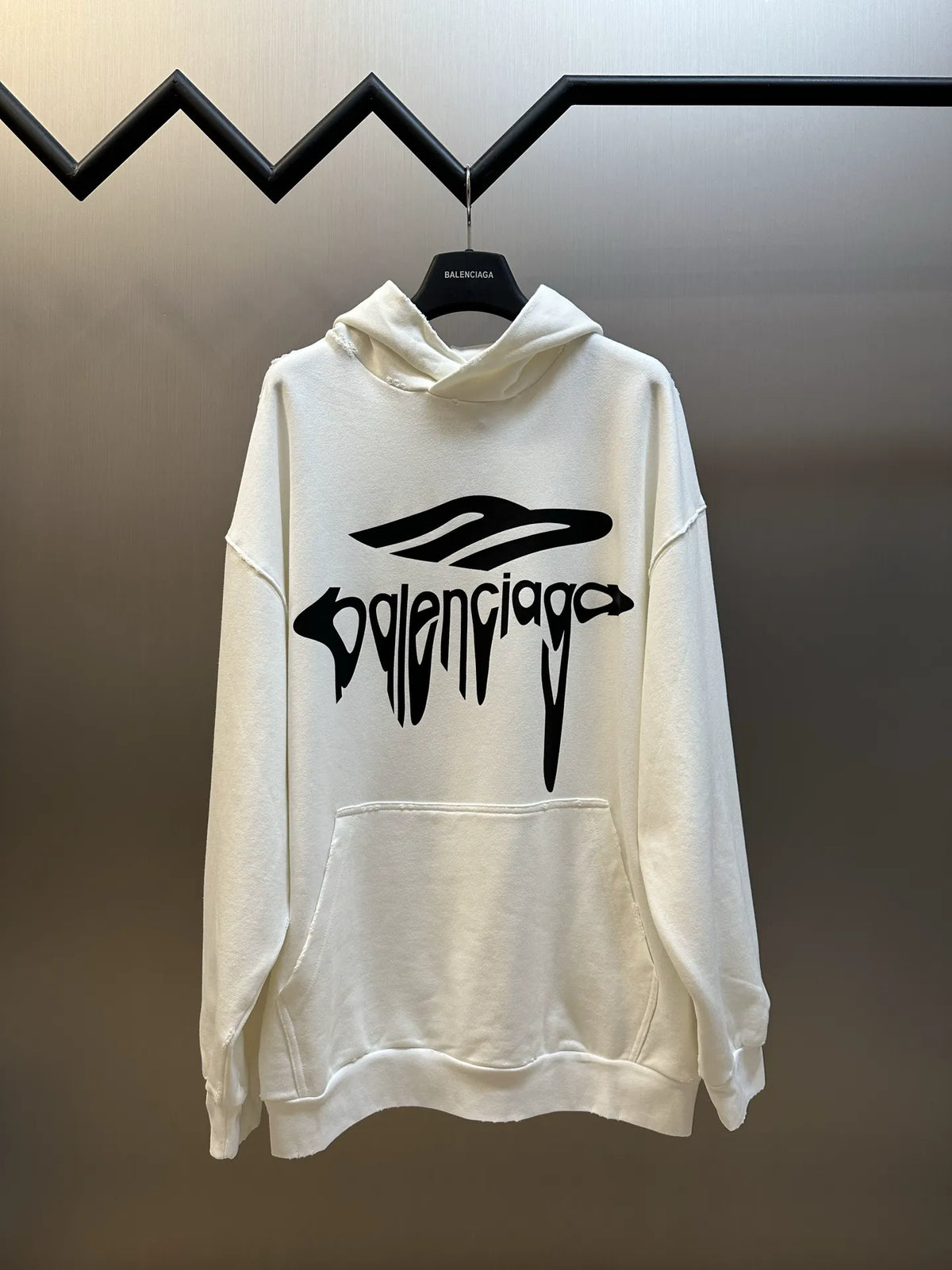 Balenciaga white long-sleeve hoodie with front logo print and kangaroo pocket