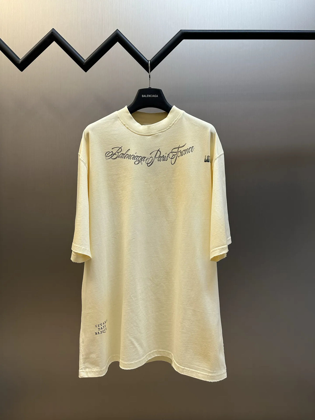Cream short-sleeve T-shirt with Balenciaga logo script print on the front