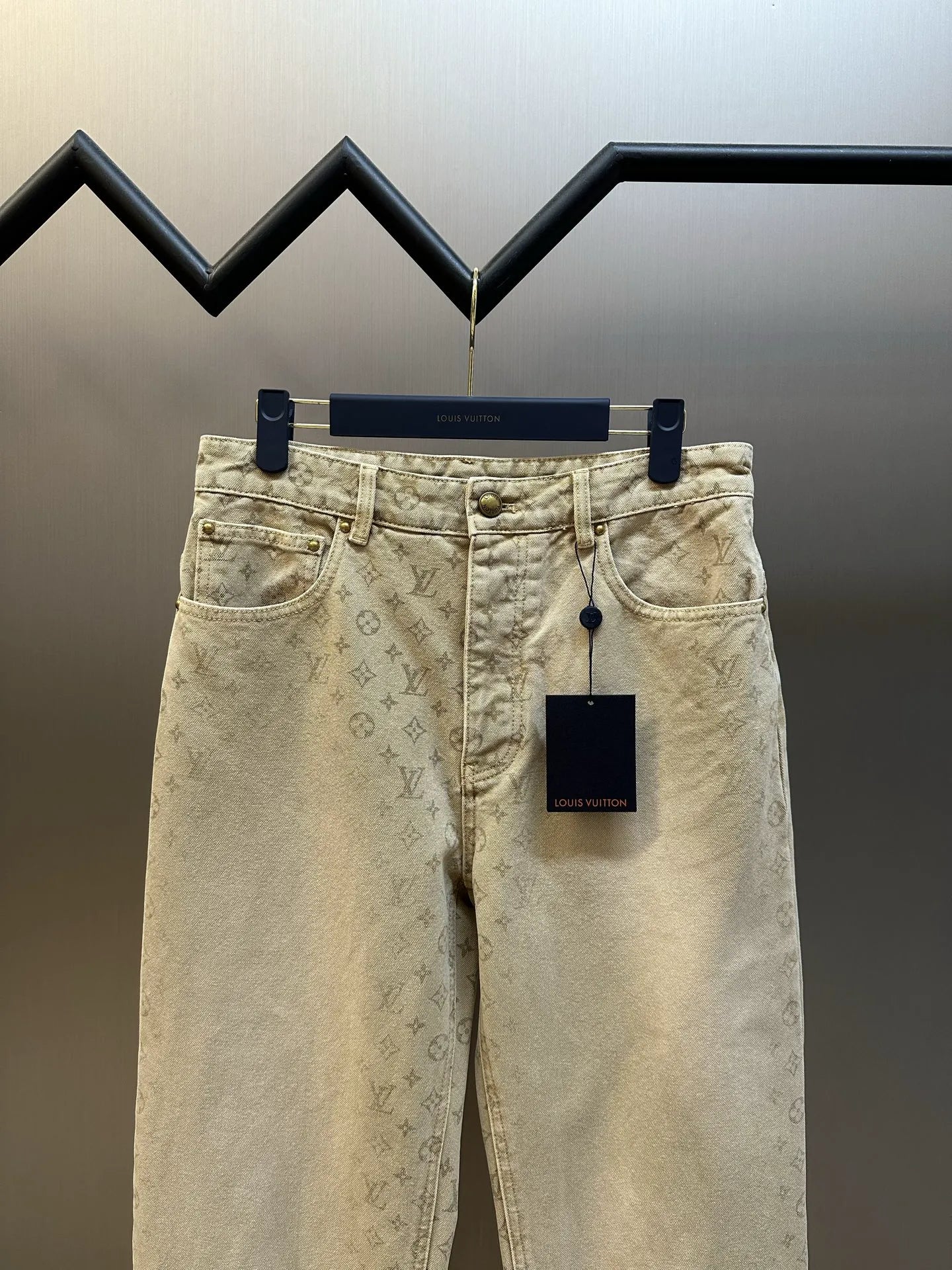 Light beige LV monogram pants, front view with belt loops and front pockets