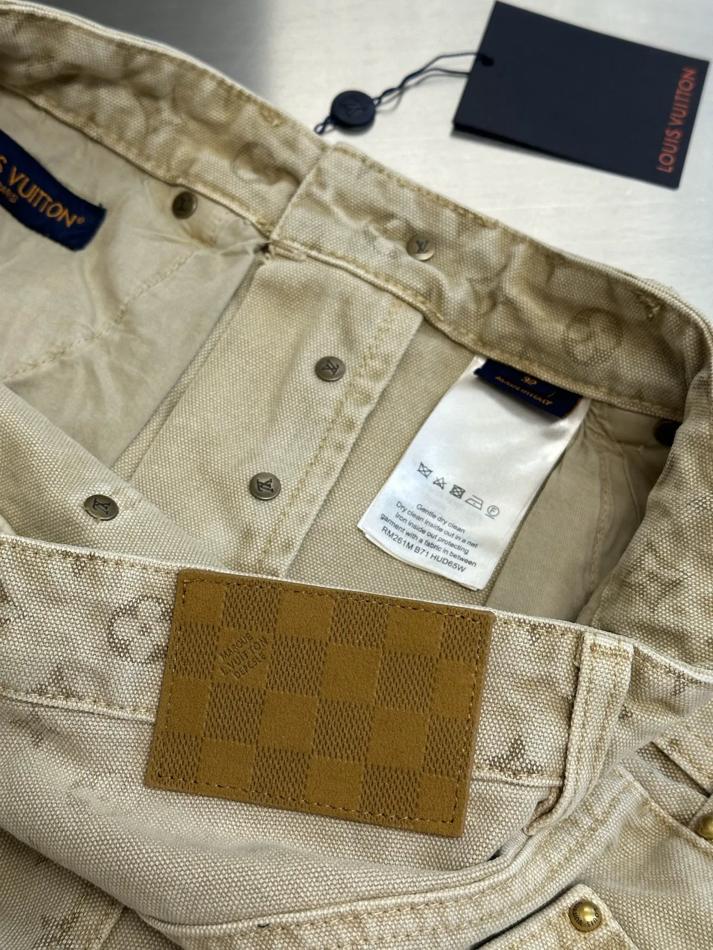 Light beige LV monogram pants, inside waistband and pocket with brown patch