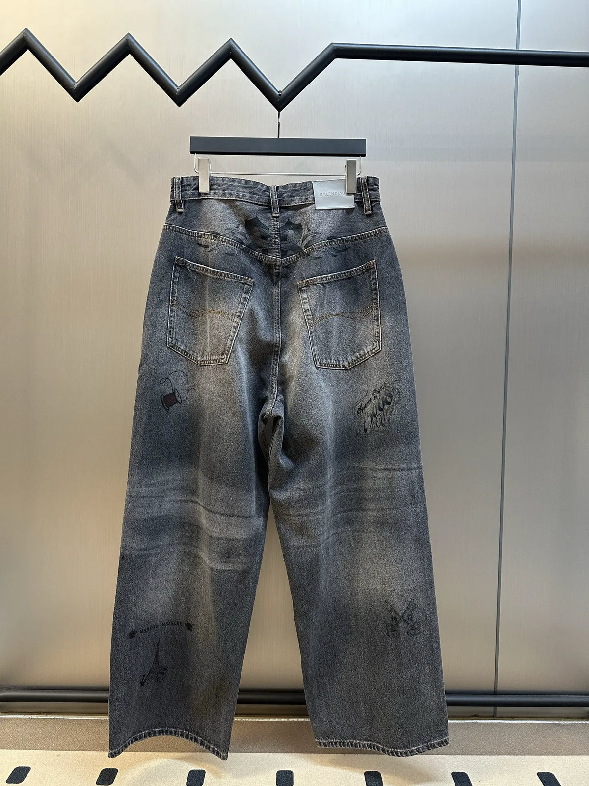 Balenciaga dark blue denim wide-leg pants with rear patch designs and patch pockets