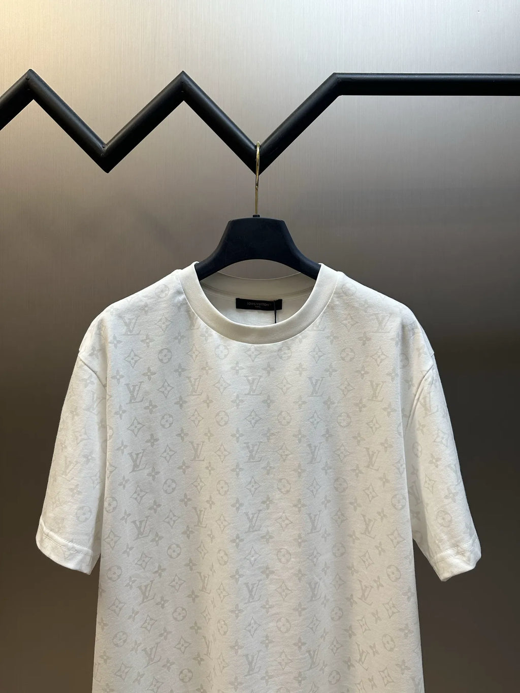White short-sleeve T-shirt on hanger, all-over monogram print, crew neck