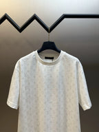 White short-sleeve T-shirt on hanger, all-over monogram print, crew neck