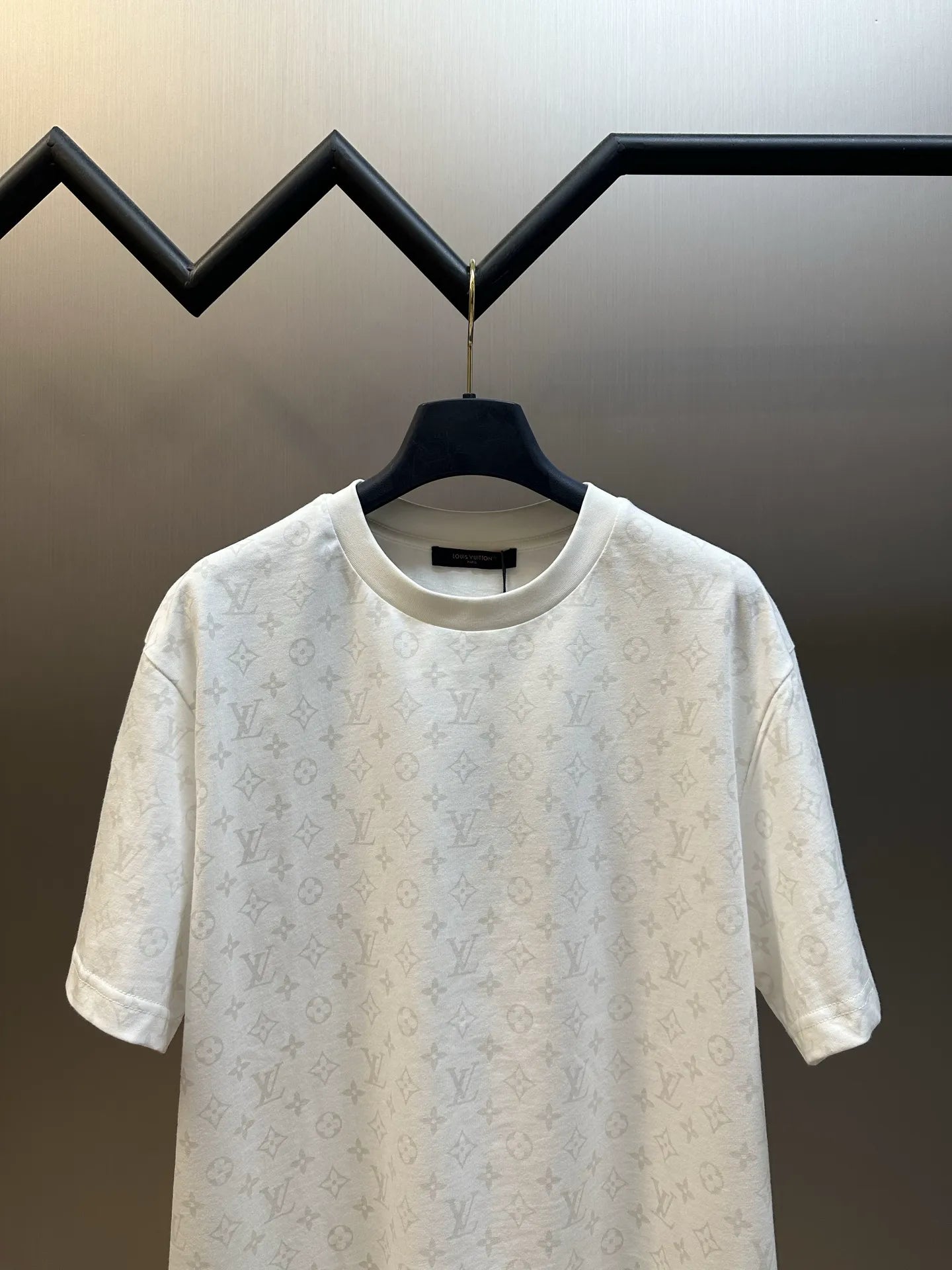 White short-sleeve T-shirt on hanger, all-over monogram print, crew neck
