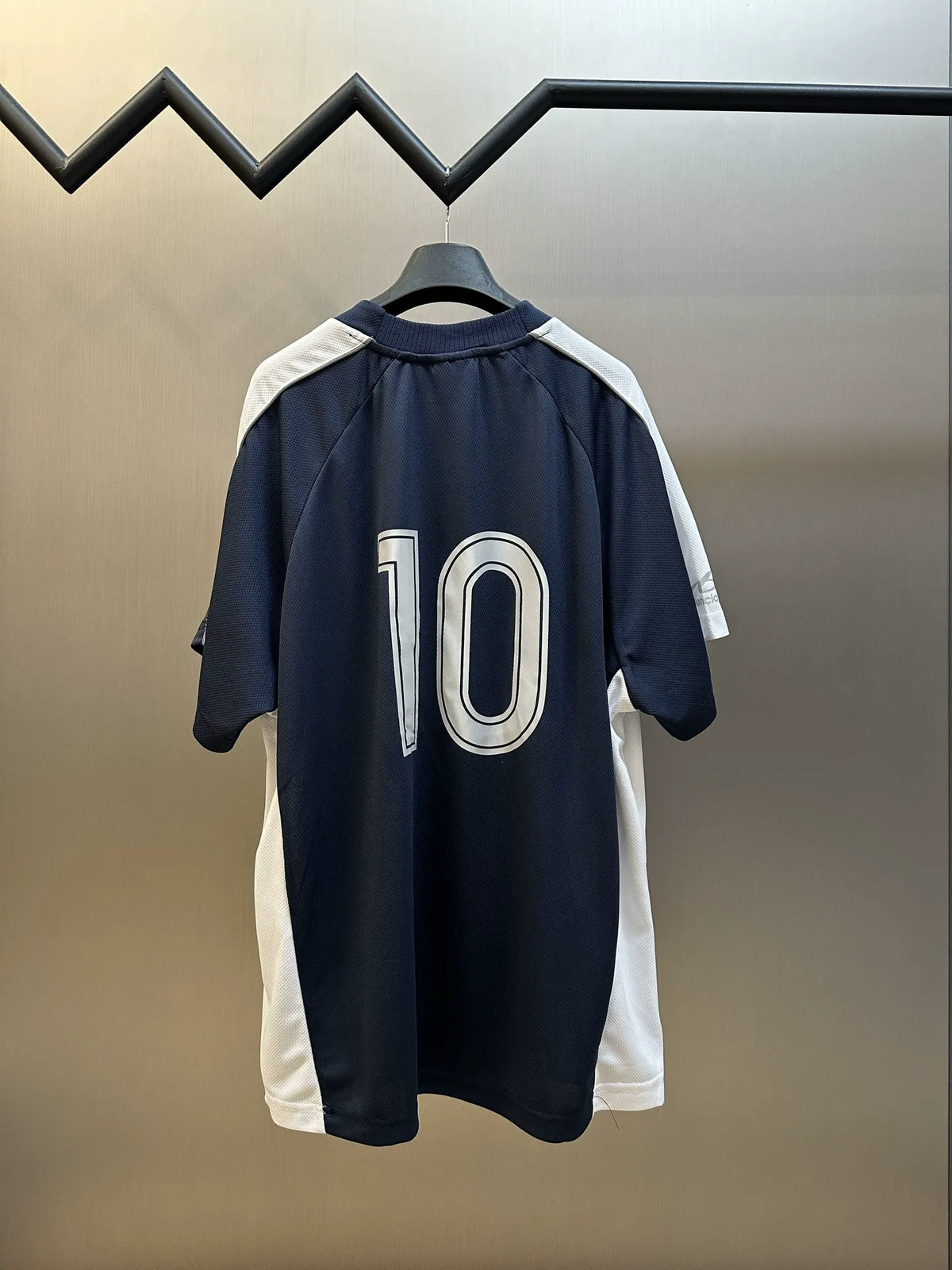 Balenciaga short-sleeve jersey shirt back view, navy with white stripes and number 10