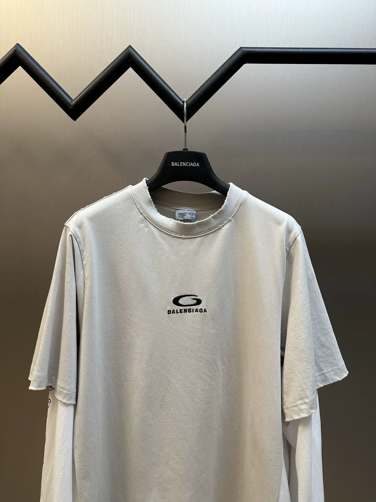 White Balenciaga T-shirt with centered chest logo, crew neck.