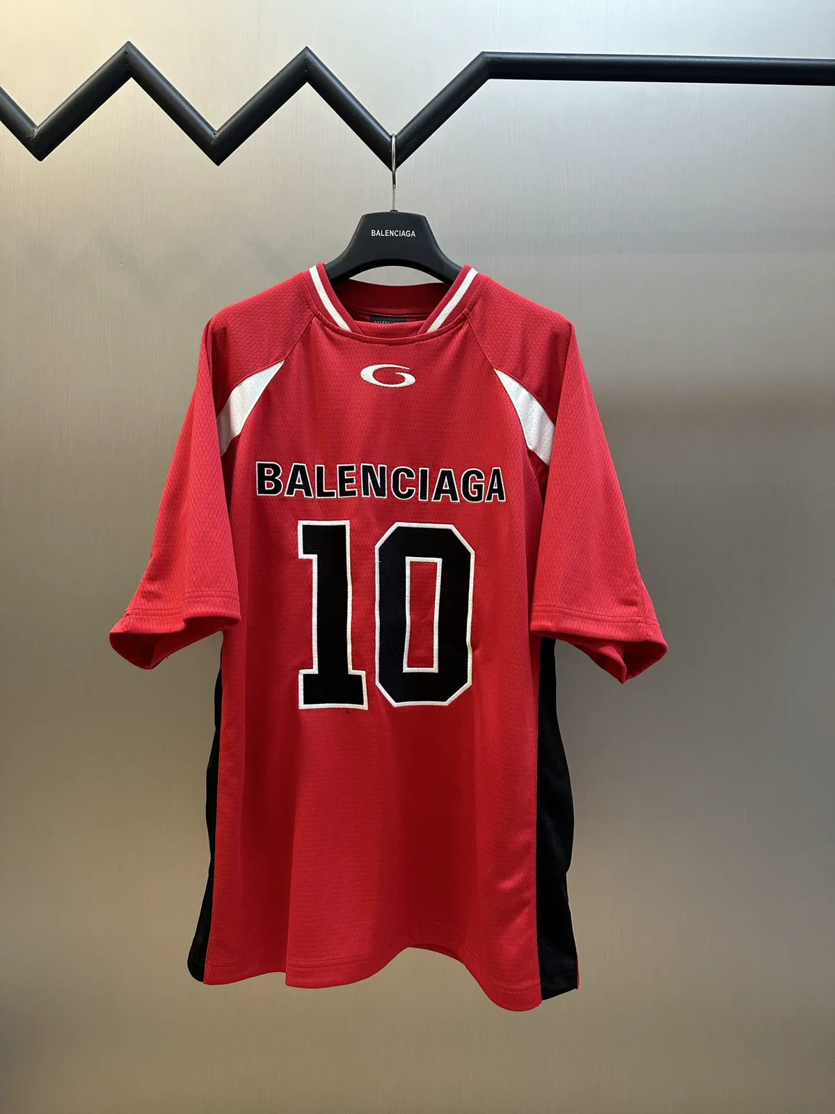 Balenciaga red short-sleeve jersey with white stripes and BALENCIAGA 10 front graphic