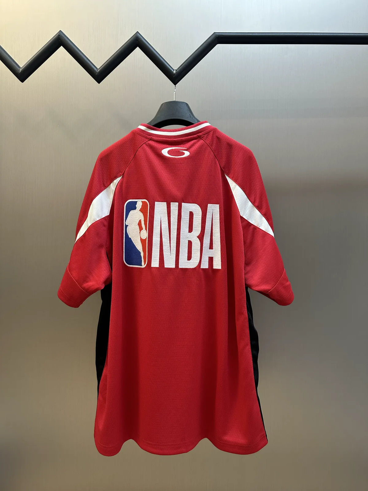 Balenciaga red short-sleeve jersey back with white NBA lettering and basketball logo