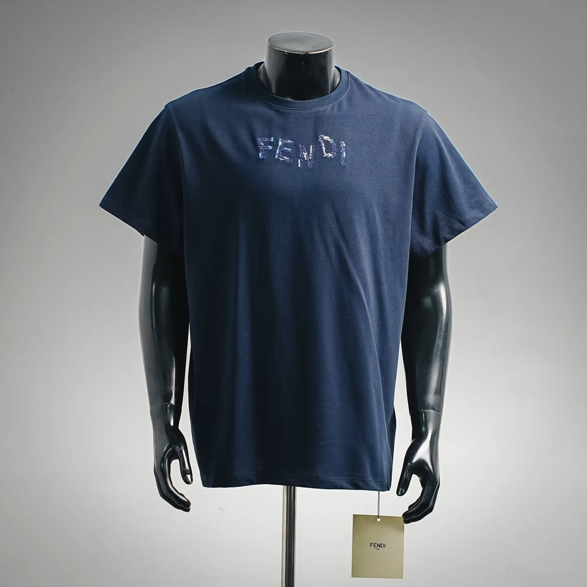 Navy FENDI crewneck T-shirt with embroidered FENDI logo on front.