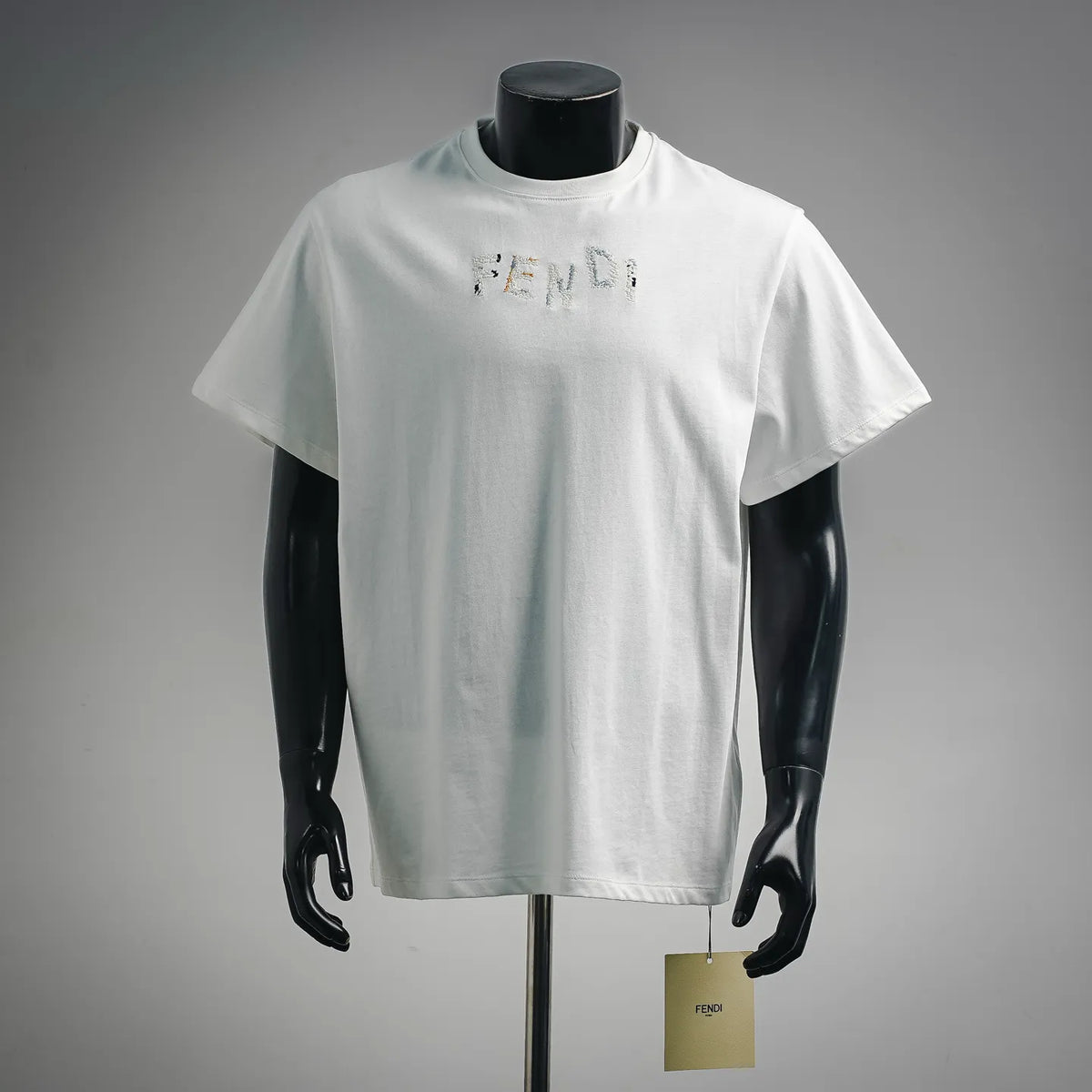 White short-sleeve T-shirt with colorful embroidered logo on chest