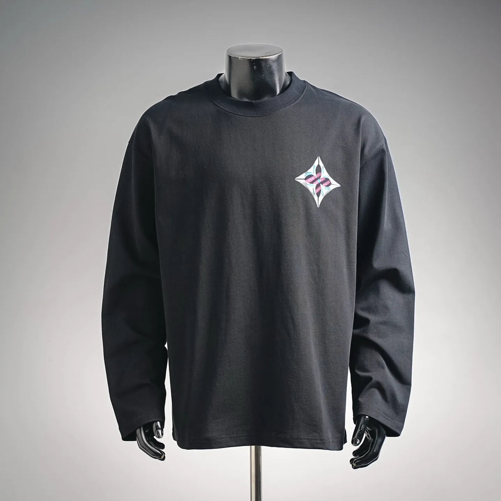 Black long-sleeve turtleneck top with multicolor diamond logo on left chest
