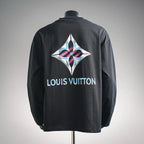 Black long-sleeve turtleneck top with large diamond logo and “LOUIS VUITTON” on back
