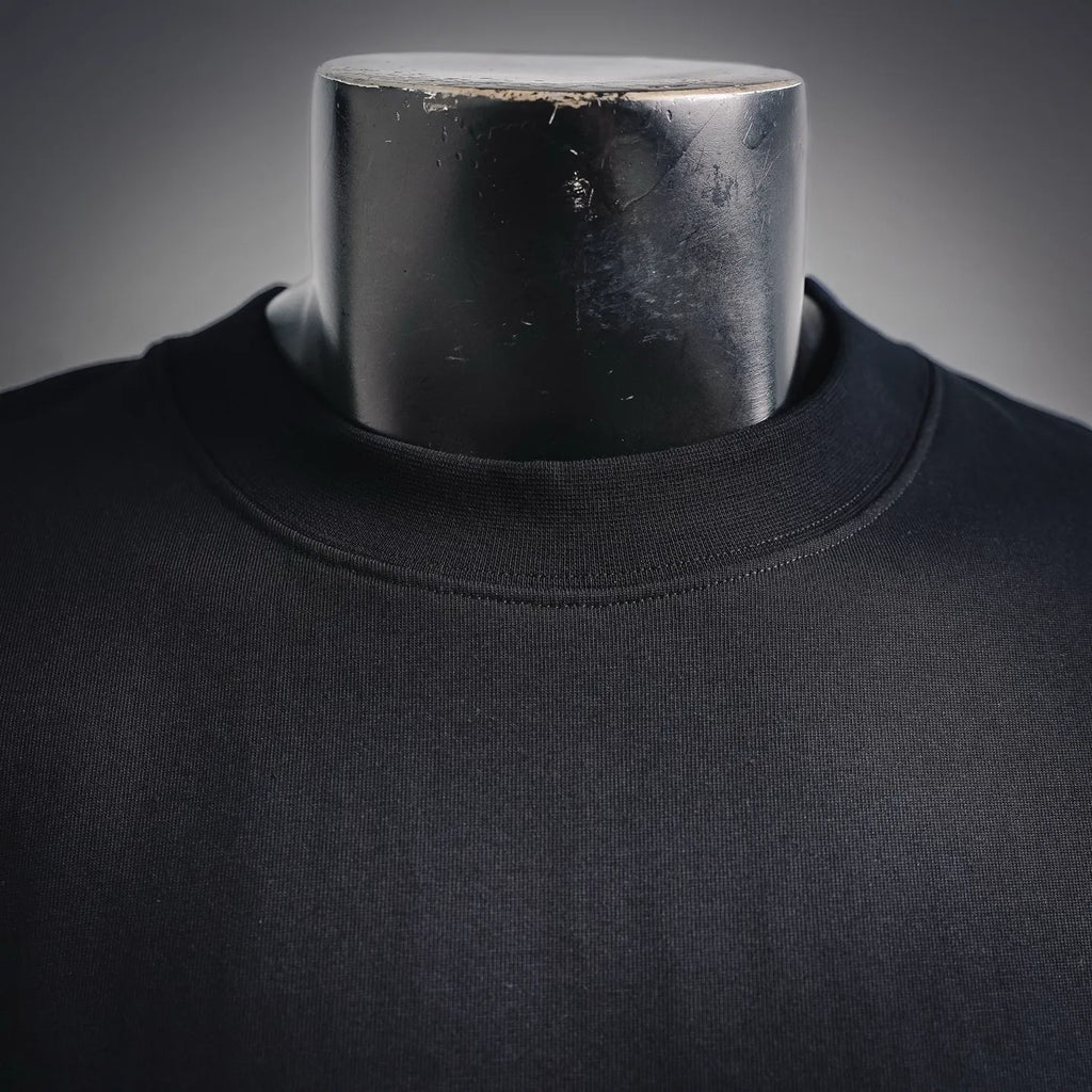 Black long-sleeve turtleneck neckline on a mannequin; plain front