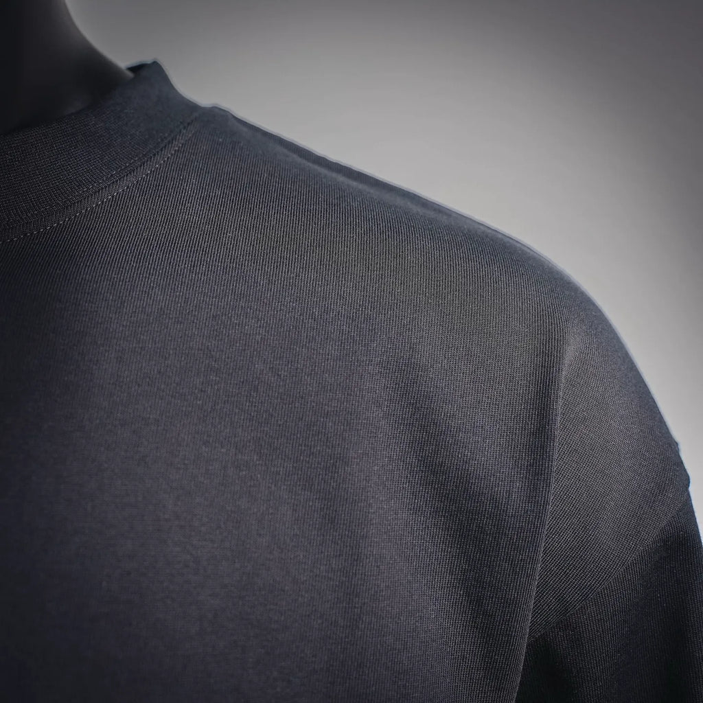 Louis Vuitton long-sleeve mock neck shirt, black fabric texture, side view