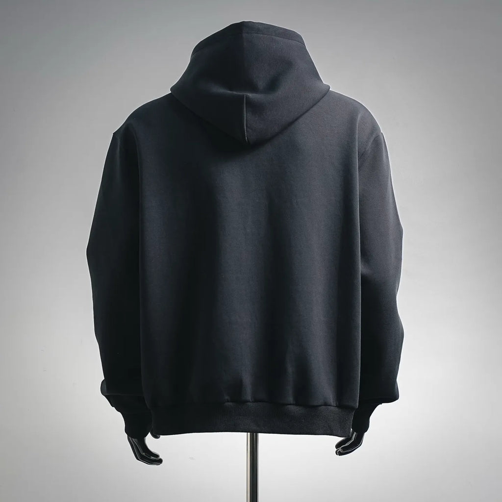 Black zip-up hoodie with hood, plain back, ribbed hem and cuffs