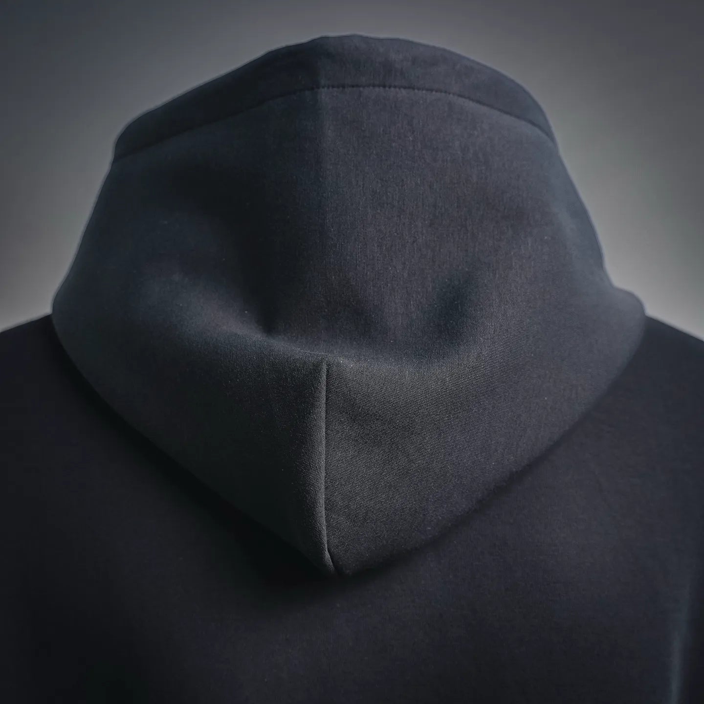 Black hoodie hood with subtle center seam detail