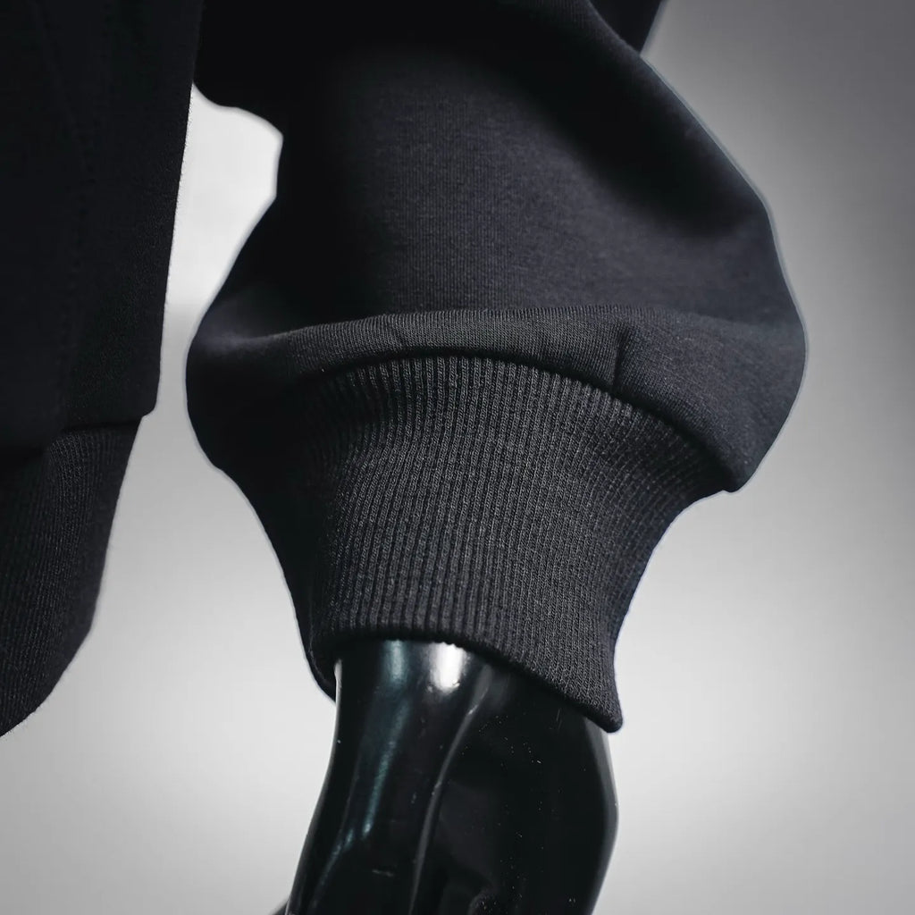 Black hoodie ribbed cuff and sleeve opening