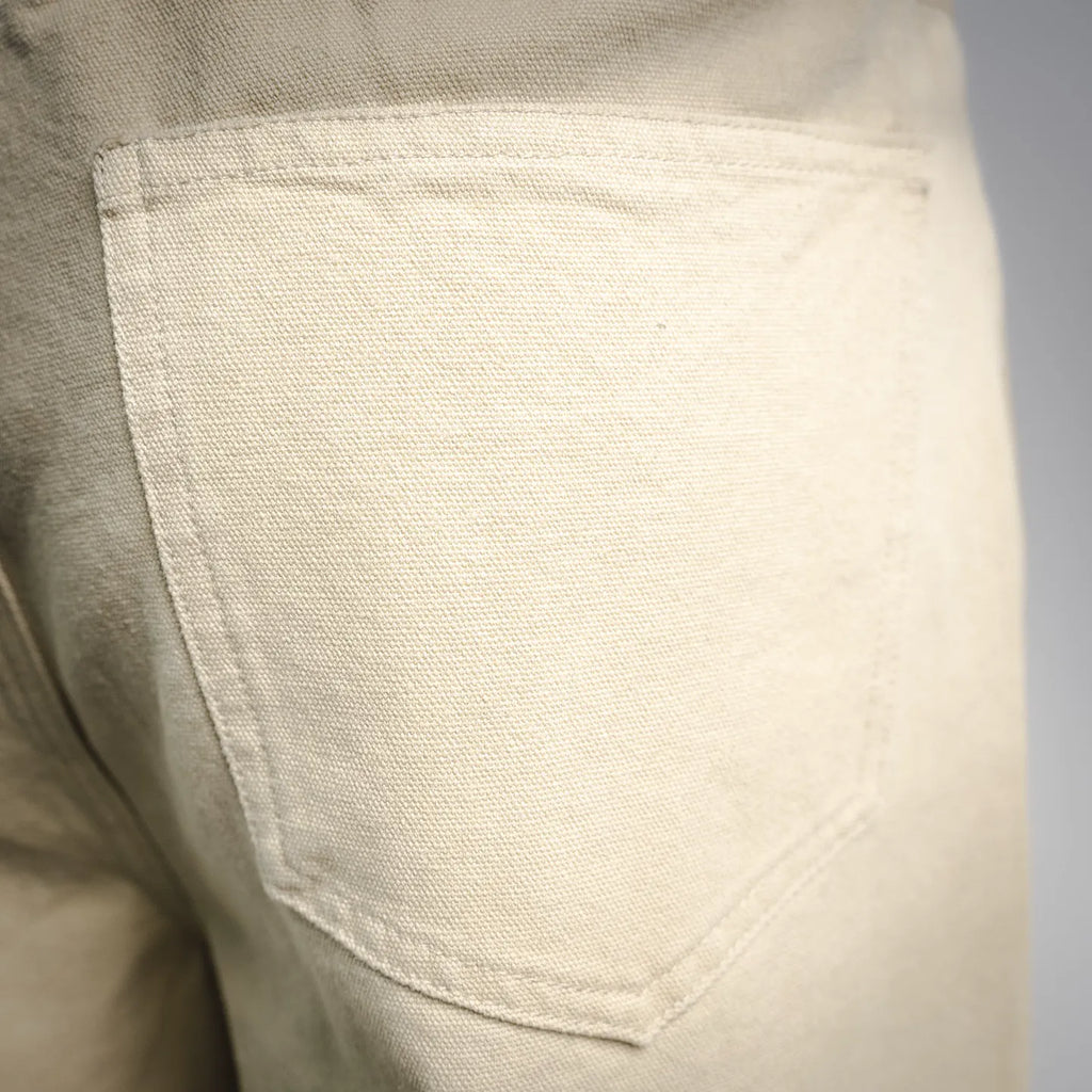 Light beige pants front pocket with stitched curved opening