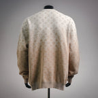 Long-sleeve sweater back view with all-over LV monogram print and crew neck.