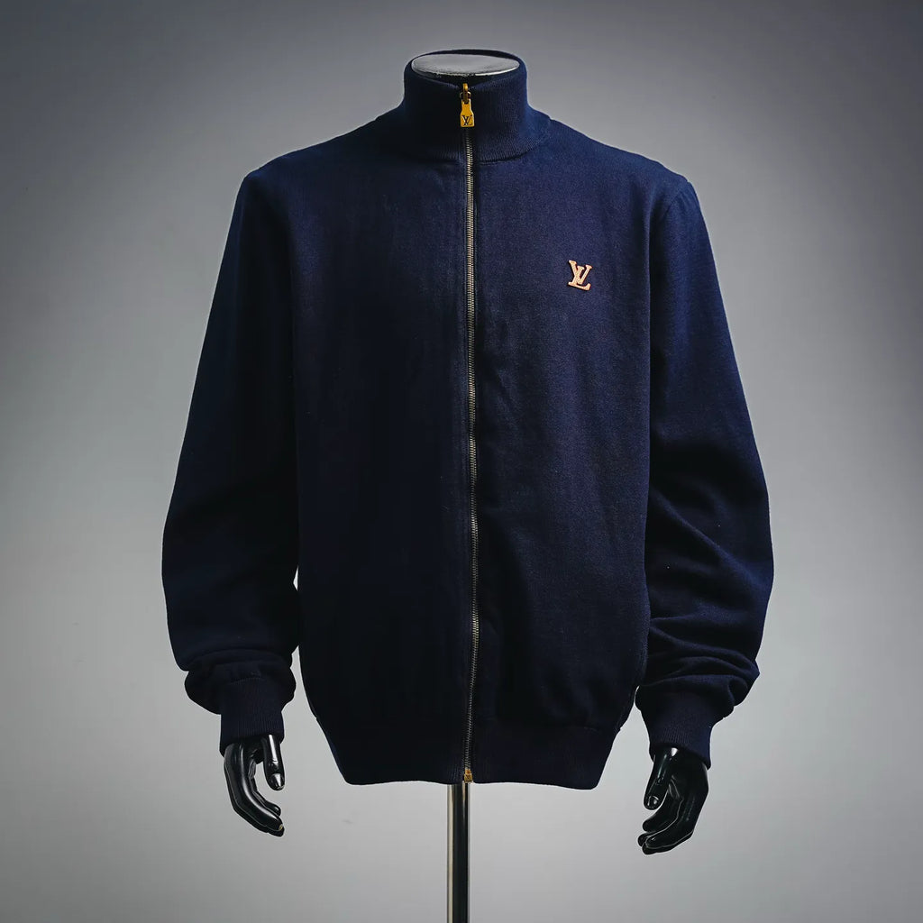 Navy LV zip-up coat with ribbed collar, cuffs, and front gold zipper hardware
