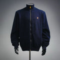 Navy LV zip-up coat with ribbed collar, cuffs, and front gold zipper hardware