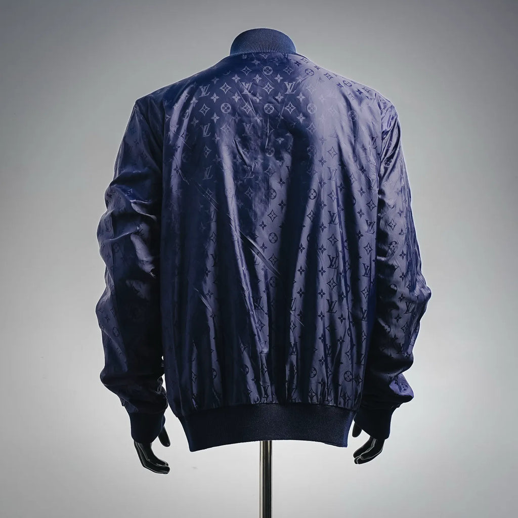 Navy LV zip-up coat, back view with allover monogram pattern