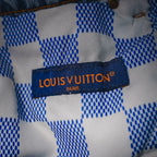 Louis Vuitton Paris fabric label on light blue denim inner waistband