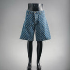 Blue denim shorts with LV-style monogram pattern, button fly and belt loops
