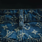 Blue denim shorts waistband with center seam and LV monogram pattern