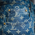 Blue denim shorts with gold buttons and LV monogram front pocket