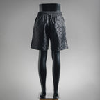 Louis Vuitton monogram shorts, back view with elastic waistband and black allover pattern