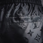 Louis Vuitton monogram shorts with front pocket and dark patterned fabric