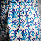 Blue and navy monogram shorts with relaxed fit and elastic waist