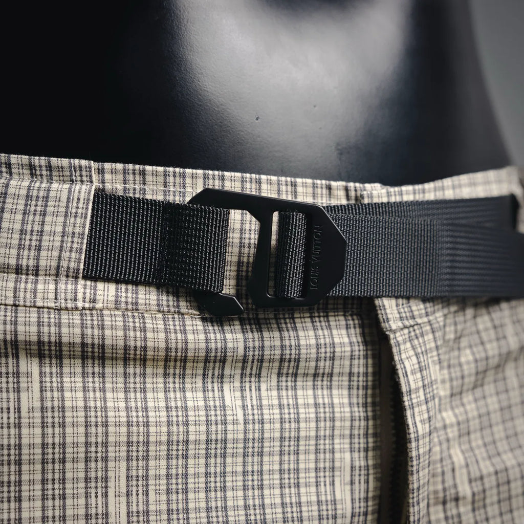 Waistband with black adjustable belt and plaid waistband panel