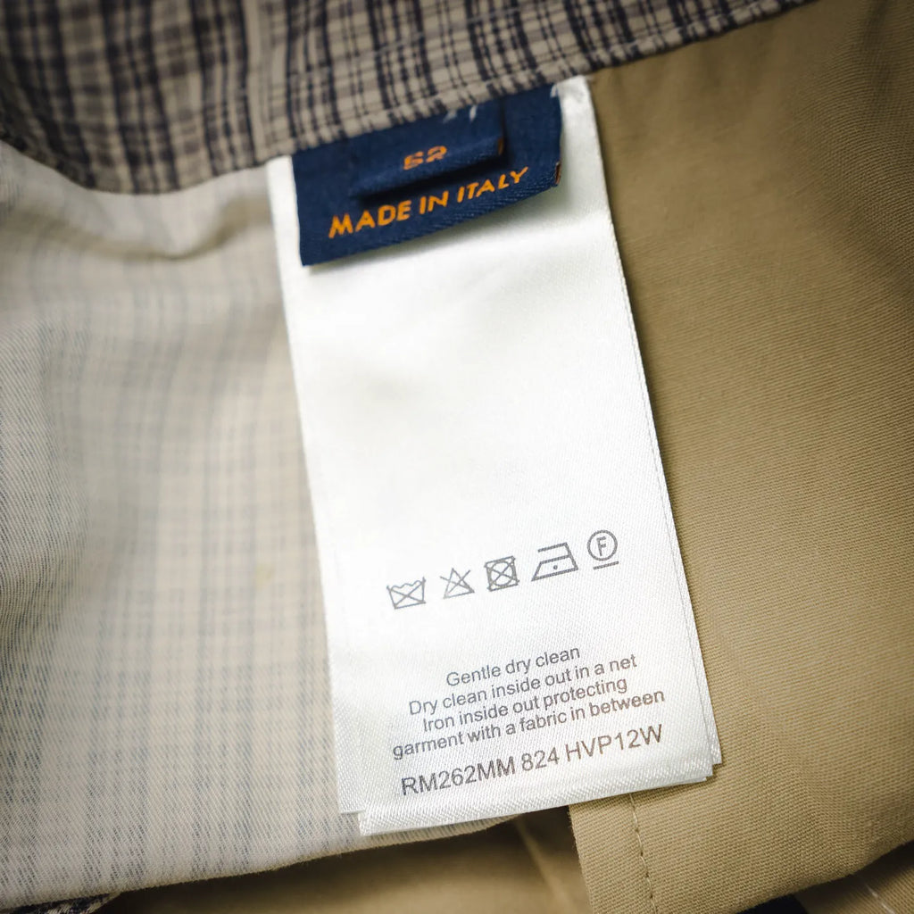 Inside care label showing "Gentle dry clean" and "Made in Italy"