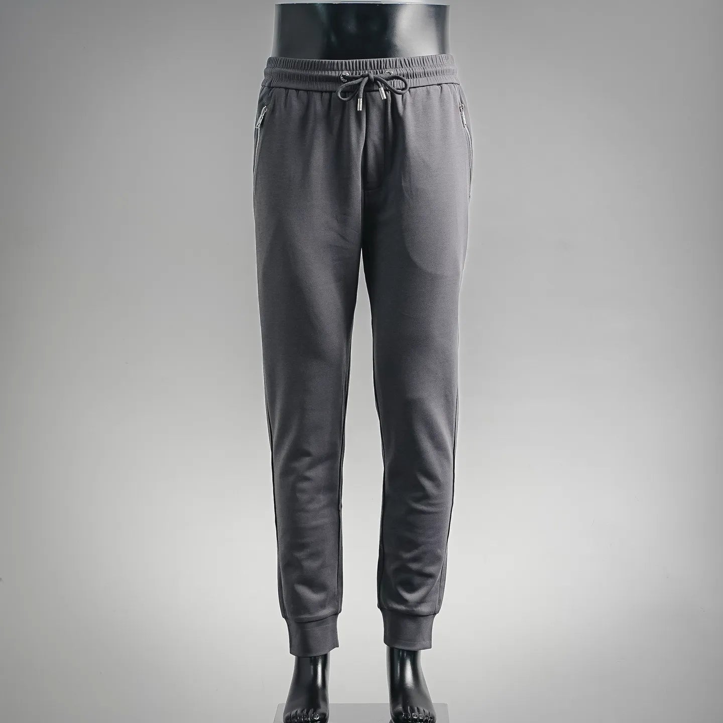 LV men's jogger pants with drawstring waist and cuffed ankles, dark gray
