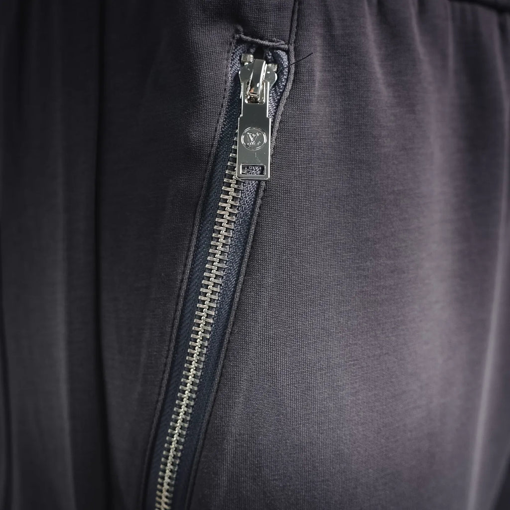 LV men's jogger pants zipper fly detail with metal zipper, dark gray